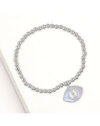 Fashnzfab - Stainless Steel Mother Of Pearl Cz Stone Rim Virgin Mary Accent Evil Eye Charm Stretch Bracelet Mother Of Pearl - Lyst