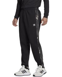 adidas - Striped Trim Fitness jogger Pants - Lyst