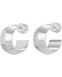 Eklexic - Wide Peak Huggie Hoops - Lyst