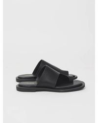 All Black - One Side Slide - Lyst