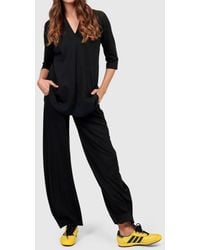 Alembika - Essential Flow Pants - Lyst