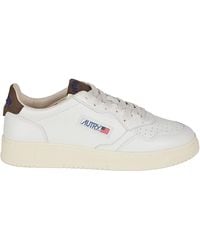 Autry - Low-Top Sneakers With Perforated Detailing And Suede Accents - Lyst