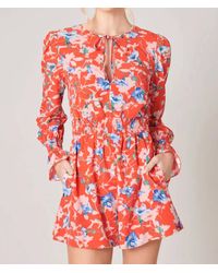 Sugarlips - By The Bay Tropical Print Long Sleeve Romper - Lyst