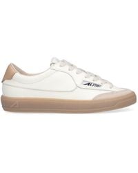 Autry - Low-Top Sneakers With Rounded Toe And Contrasting Heel Tab - Lyst