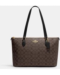 Coach Outlet Ashton Tote In Signature Canvas in Brown | Lyst