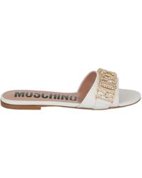 Moschino - Crystal Embellished Logo Flat Sandals - Lyst
