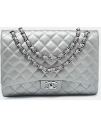 Chanel - Quilted Leather Maxi Classic Double Flap Bag - Lyst