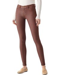 DL1961 - Emma Low Rise Coated Skinny Jeans - Lyst