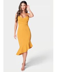 Bebe - Crossover Flounce Scuba Dress Mustard Crepe Asymmetrical Jdm011 - Lyst