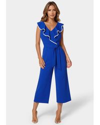 Bebe - Scuba Crepe Ruffle V-Neck Jumpsuit - Lyst