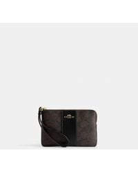 COACH - Corner Zip Wristlet - Lyst
