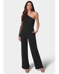 Bebe - Long Sleeve Mesh One Shoulder Jumpsuit - Lyst