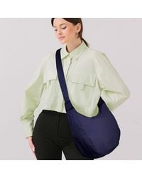 Fashnzfab - Solid Nylon Sling Bag Crossbody Bag - Lyst