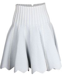 Alaïa - Alaia Dotted High-rise Flared Mini Skirt - Lyst