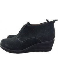 Dansko - Cadee Suede Leather Wedge Lace Up Bootie - Lyst
