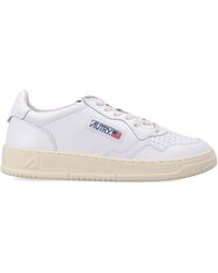 Autry - Minimalist Low-Cut Sneakers With Perforated Design - Lyst