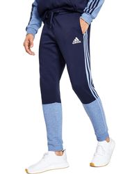 adidas - Striped Fitness jogger Pants - Lyst