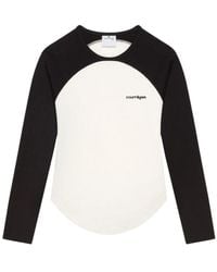 Courreges - Long-Sleeved Contrast T-Shirt With Rounded Hem And Logo Print - Lyst
