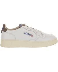 Autry - Low-Top Leather Sneakers With Suede Heel Tab And Logo Details - Lyst