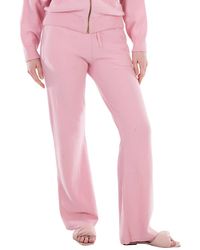 Versace - Ribbed-Knit Flared Trousers, Brand Size 40 (Us Size 4) - Lyst
