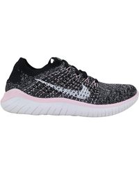 Nike Free Rn Flyknit Sneakers for Women - Up to 49% off | Lyst