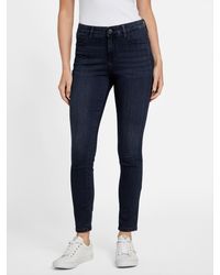 Guess - Eco Carina Mid-Rise Bling Pocket Skinny Jeans - Lyst