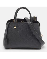 Louis Vuitton - Monogram Empreinte Leather Montaigne Bb Bag - Lyst