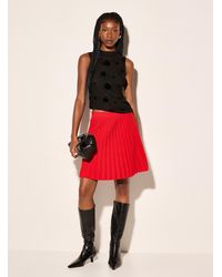 Icône - Thick Knit Accordion Pleat Miniskirt - Lyst