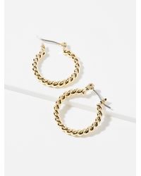 Simon's - Small Twisted Metallic Hoops - Lyst