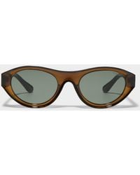 Komono - Celeste Concave Oval Sunglasses - Lyst