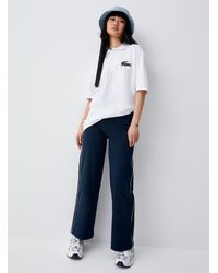 Lacoste - Crocodile Patch Loose Polo - Lyst