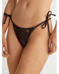 Women's Guess Bikinis and bathing suits from $14 | Lyst