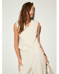 Icône - Dense Crepe Shoulder Pads Crossover Vest - Lyst