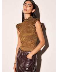 Icône - Stretch Lace Ruffled Collar Bodysuit - Lyst