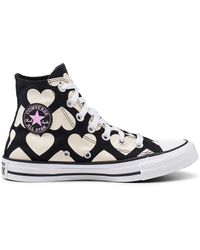 converse high tops with the heart