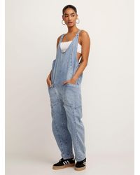 Free People - High Roller Faded Denim Jumpsuit - Lyst