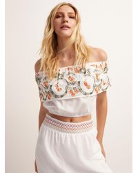 Icône - Large Ruffle Embroidered Cropped Blouse - Lyst