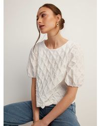Icône - Short Puff Sleeves Textured Blouse - Lyst