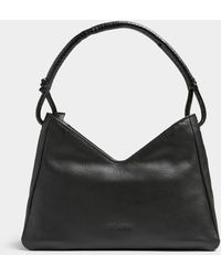 STAUD - Valerie V Cutout Leather Baguette Bag - Lyst