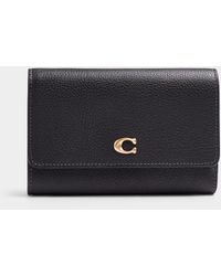 COACH - Signature Leather Flap Wallet - Lyst