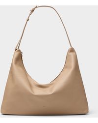 Ela - Supple Trapezoidal Hobo Bag - Lyst