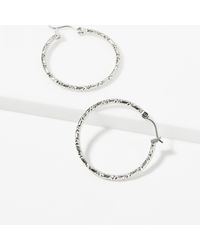 Simon's - Engraved Hoops - Lyst