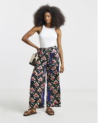 Simply Be - Geo Print Satin Wide Leg Trousers - Lyst