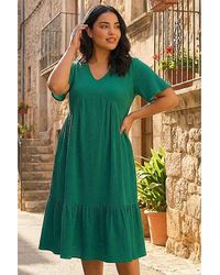 Roman Curve - Textured V-Neck Midi Dress - Lyst