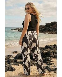 Roman Curve - Leaf Print Stretch Trousers - Lyst
