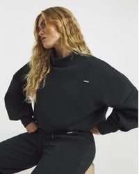 Sculpt Activewear - High Neck Jumper - Lyst