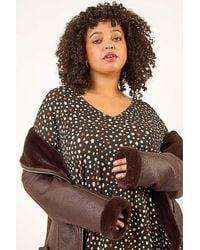 Roman Curve - Spotted V-Neck Stretch Top - Lyst