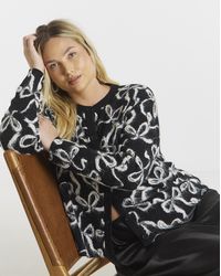 Simply Be - Bow Print Fluffy Crew Neck Cardigan - Lyst