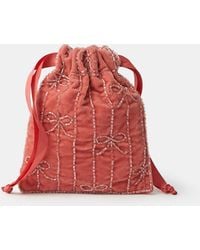 Accessorize - Bow Velvet Drawstring Bag - Lyst