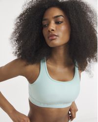 Under Armour - Crossback Mid Support Bra - Lyst